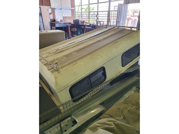 ~/upload/Lots/141756/AdditionalPhotos/y7eghkycatsr6/Toyota Hilux Steel Canopy_t600x450.jpg